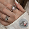 Retro fashionable ring, silver 925 sample, on index finger