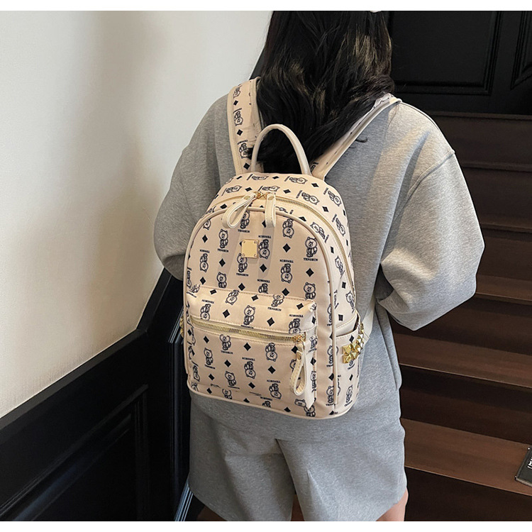 A cute little bear backpack for female college students in 2025, a new fashionable and trendy backpack with a large capacity undefined
