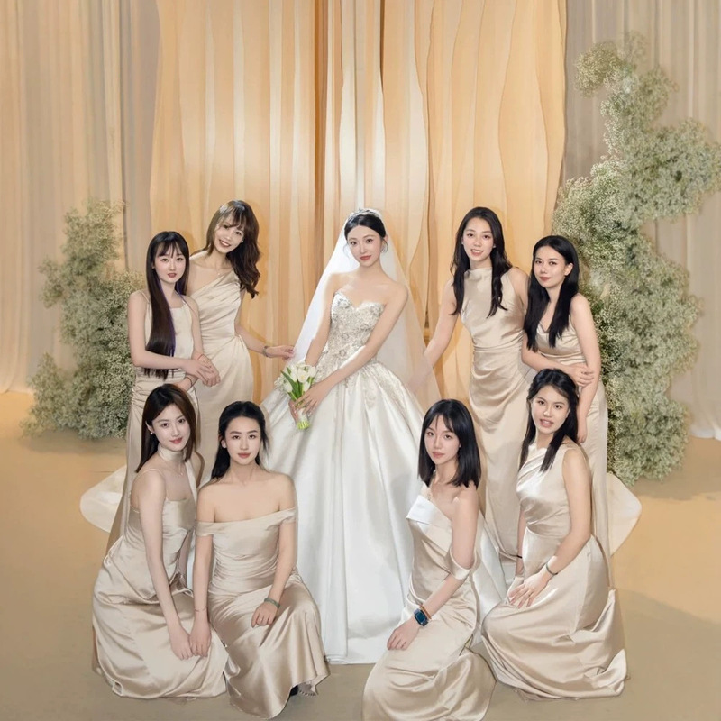 Champagne-colored satin luxury halter-neck elegant backless bridesmaid dress with ribbon design, waist-cinching and slimming A-line long dress