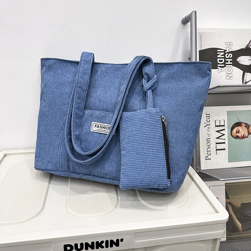 2025 otoño e invierno nueva moda bolso de hombro de pana de gran capacidad bolso de mano fresco estilo japonés bolso grande de pana de color puro para mujer