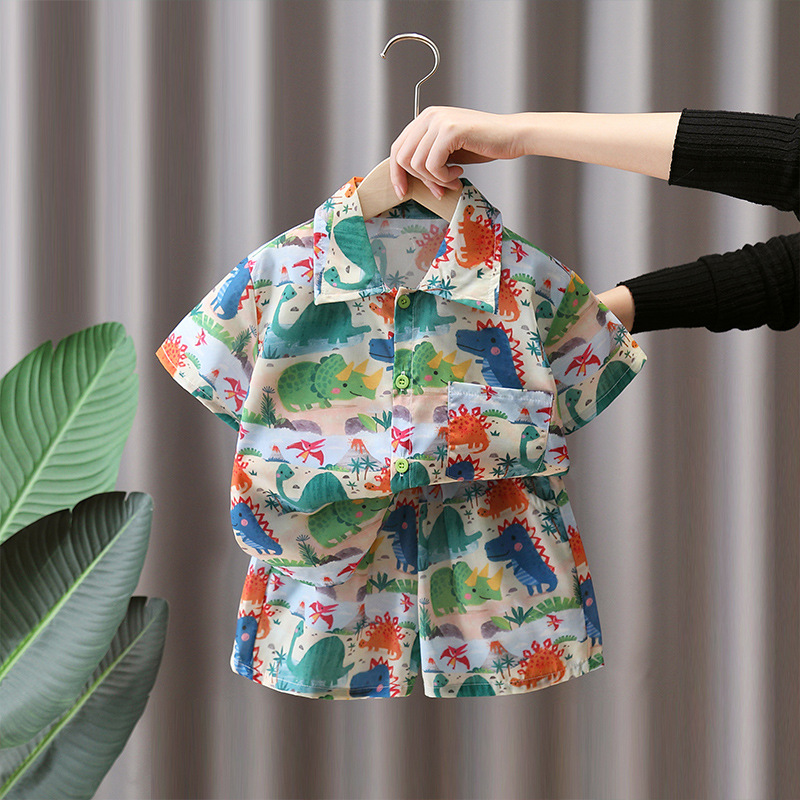 7182 Traje de camisa de dinosaurio para niños 2025 nuevo estilo estilo occidental verano de manga corta ropa de dibujos animados ropa de verano Han Fan para niños
