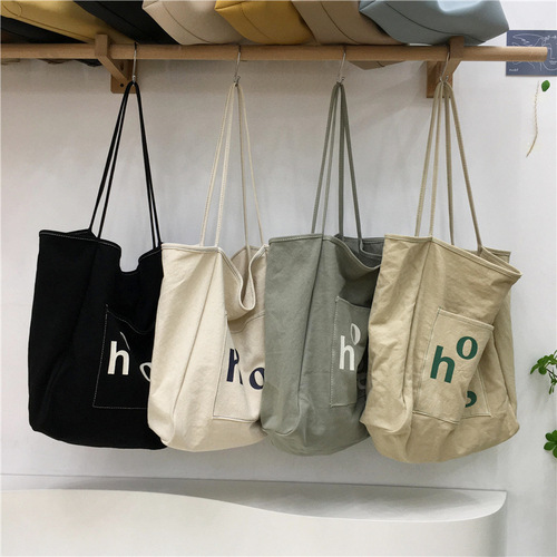 Literary ins super popular canvas bag women's shoulder portable large capacity shopping bag  new trendy simple tote bag