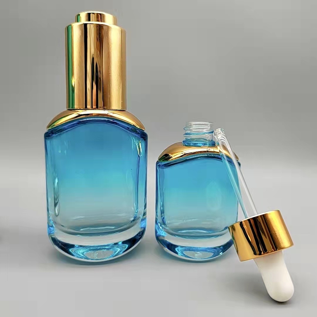 Fabricante en stock 15 ml30ml50ml botella ovalada botella cuentagotas botella de aceite esencial botella de loción botella de esencia transparente