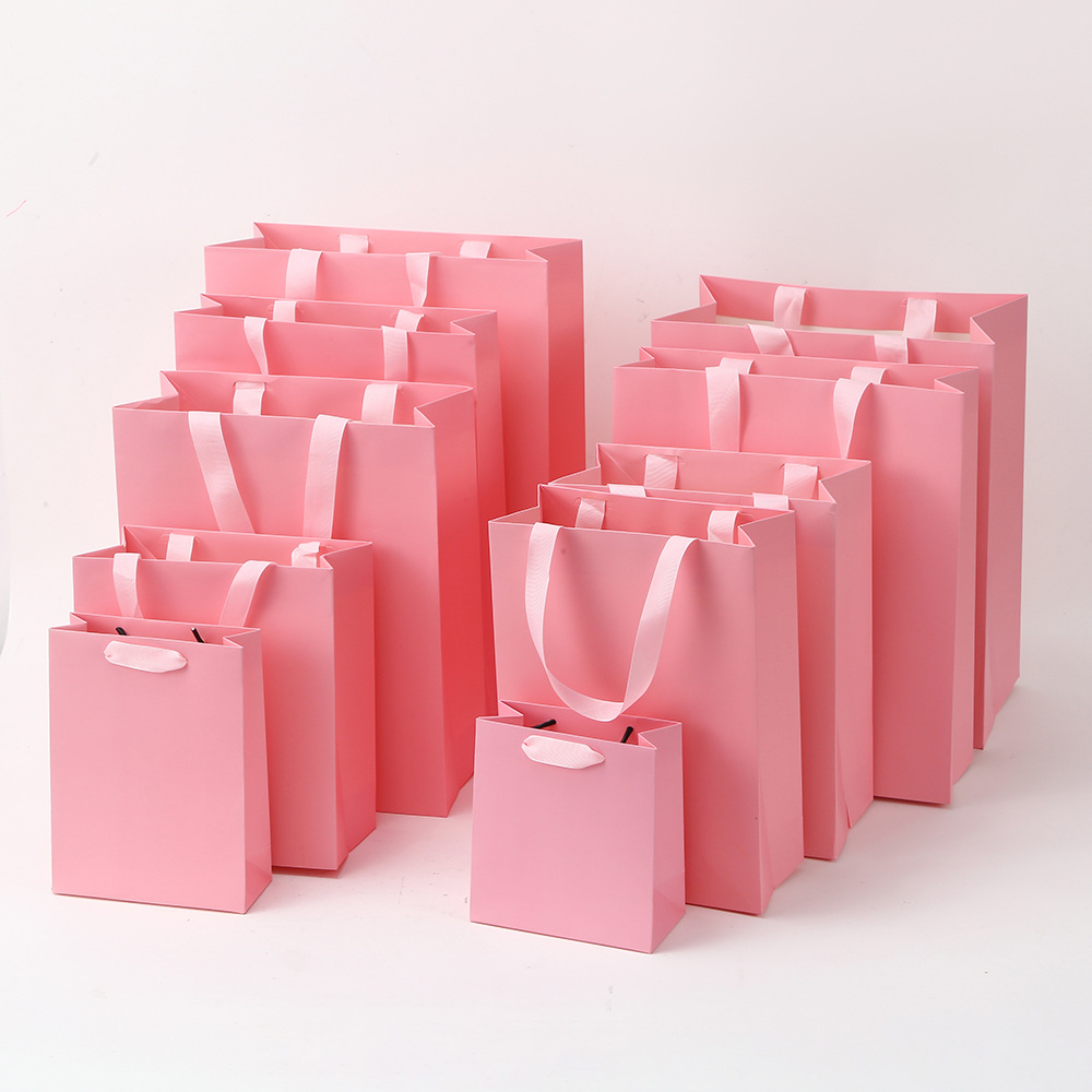 Bolsa de cartón blanco logotipo tienda de ropa bolsa de mano bolsa de regalo espesa bolsa de regalo de Navidad se puede imprimir