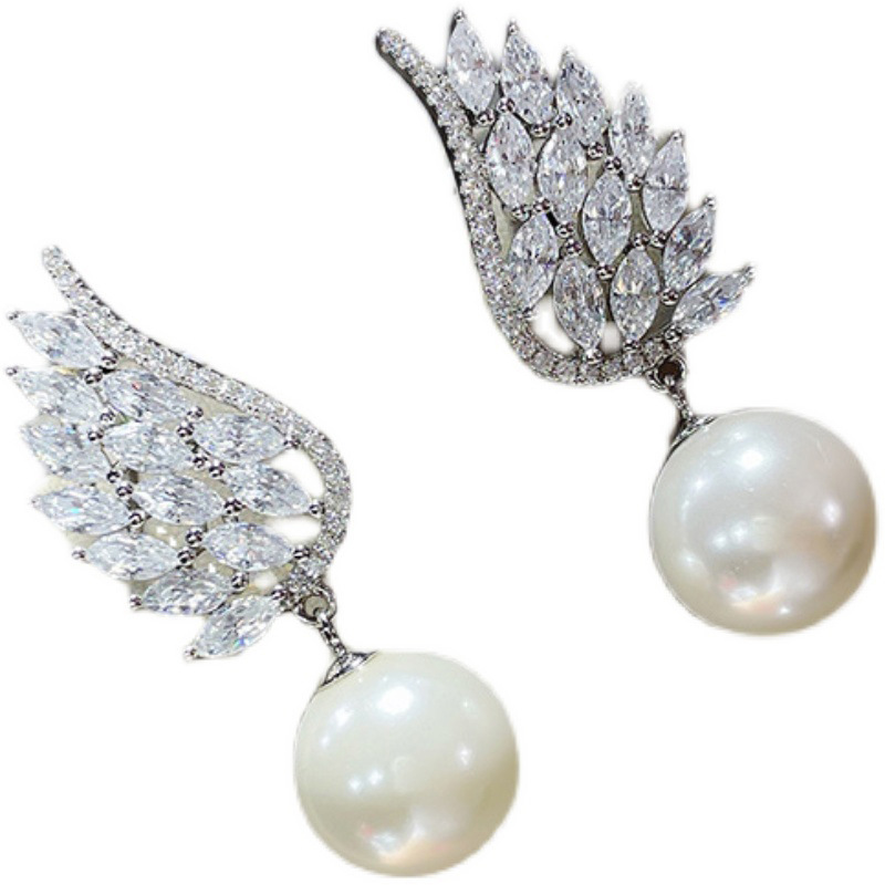Boucles d oreilles pendantes perle ailes d ange élégantes_voghion.com