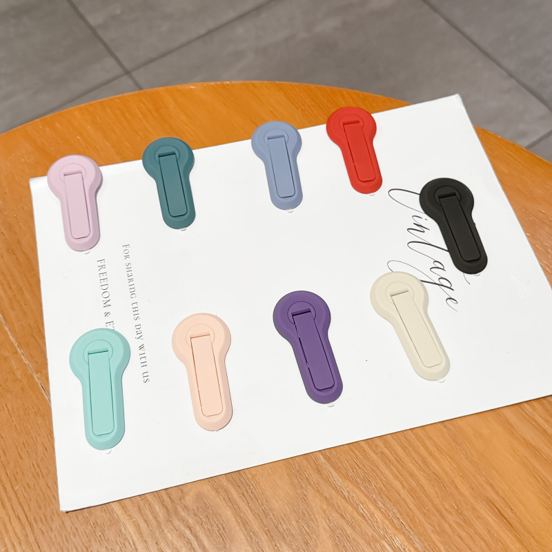 Wholesale 360-degree rotatable phone case back-mounted stand in macaron colors, dual-use stand, ins style Wholesale 360-degree rotatable phone case back-mounted stand in macaron colors, dual-use stand, ins style