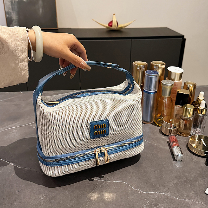 Bolso de maquillaje doble capa azul