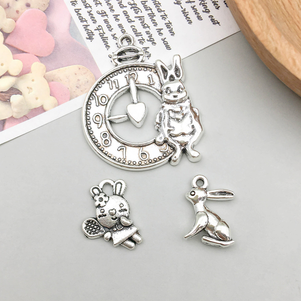 2g Weight Pendant Jewelry Making Type 17*24mm Jewelry Making Size DIY Jewelry Accessories Classification 11 Models, 2 Each, 22/Bag Quantity Zinc alloy Material Rabbit Pattern Polished Finish Plating Design Cute Style 11 Models, 2 Each, 22/Bag 17*24mm Zinc Alloy Rabbit Polished Pendant 1