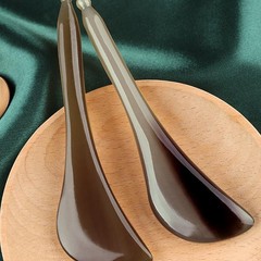 メーカーの卸売りの白い水牛の角は筋の棒の美容の顔の通用する顔の板をかき回します。