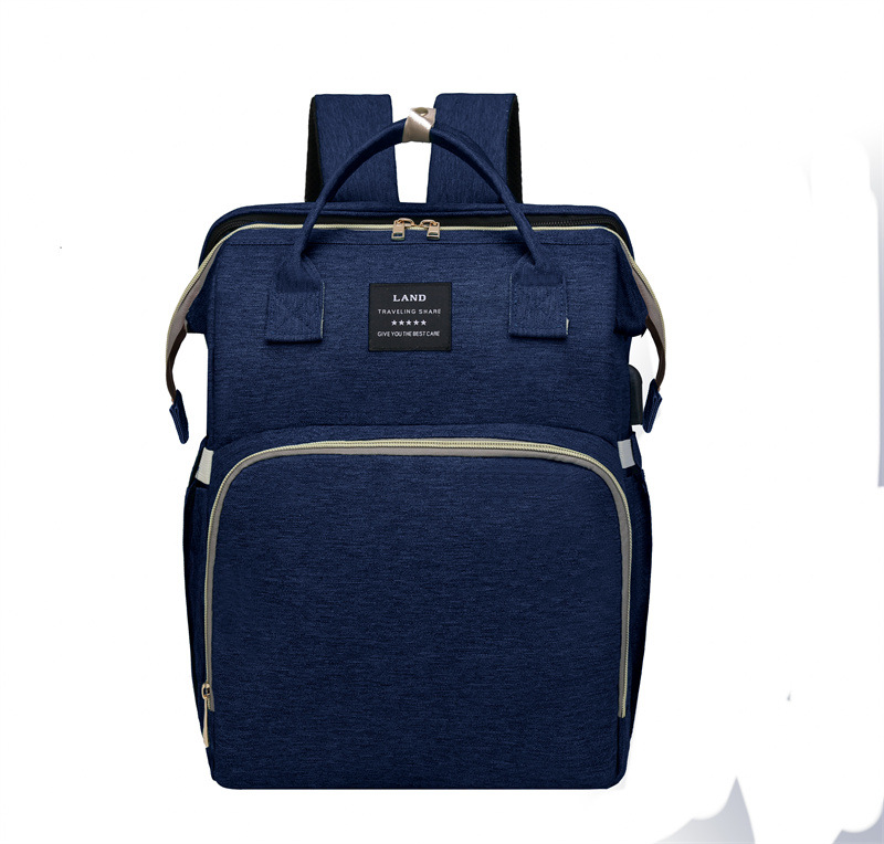 Japonés y coreano nuevo bolso de la momia mochila Oxford impermeable ultra-ligero de gran capacidad hacia fuera la madre y el bebé bolsa de leche para juguetes gratis