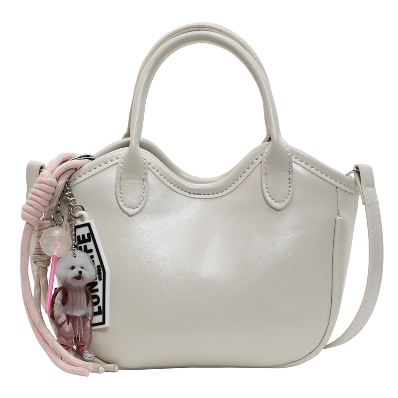 Bolso de tendencia extranjera, bolso de mano de mujer 2025, nuevo estilo de moda, bolso de cubo de hombro casual, mochila de textura de alta calidad