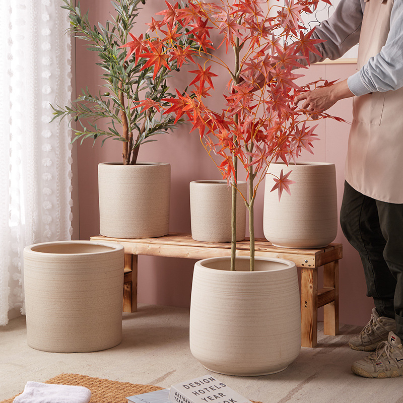 High-grade simple handmade ceramic flowerpot stoneware breathable large diameter indoor courtyard balcony creative green plant ornaments High-grade simple handmade ceramic flowerpot stoneware breathable large diameter indoor courtyard balcony creative green plant ornaments