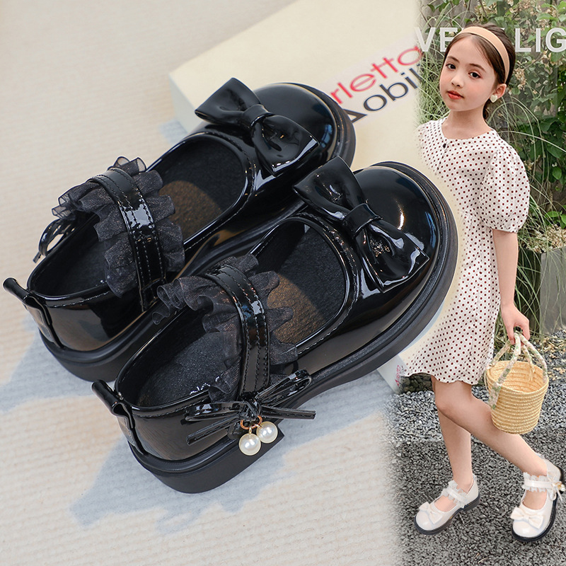 Zapatos de cuero de niñas dulces zapatos de arco princesa 2025 nuevos zapatos negros para niños zapatos de solos británicos