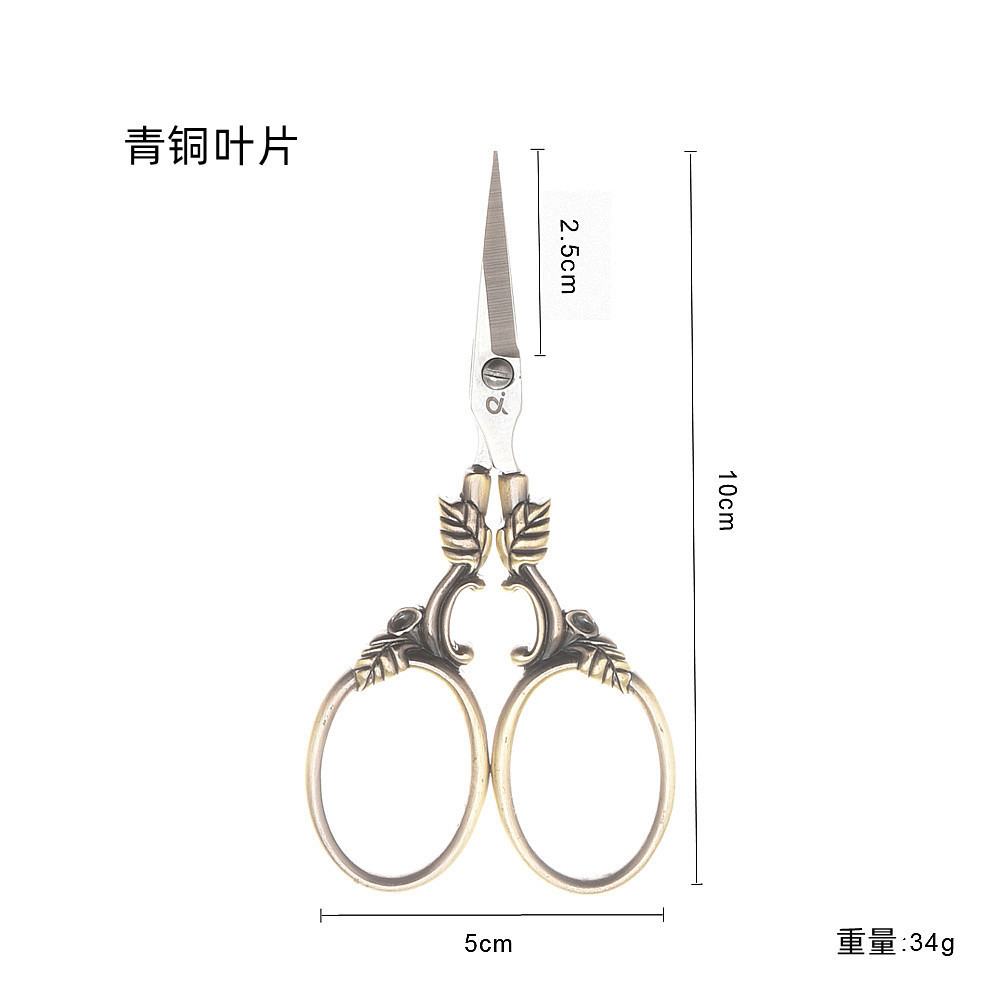 Hoja al por mayor forma exquisita tijeras pequeñas flor de punto de cruz clásica europea hoja de caja de acero inoxidable