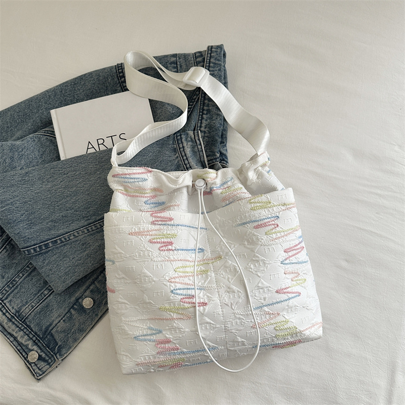 Bolsas de primavera y verano de mujeres de gran capacidad 2025 nuevo pequeño paquete de hombro, bolsas de viaje, bolsas de ocio plegadas