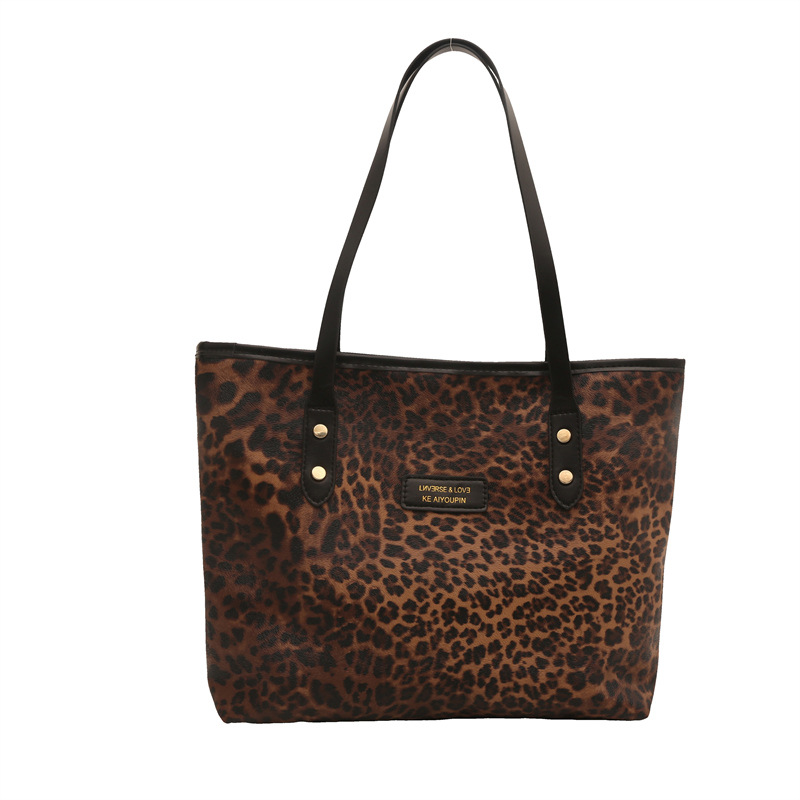 Alta textura leopardo bolso grande 2024 nuevo estilo bolso de moda estilo extranjero hombro de gran capacidad bolso de viaje para mujeres