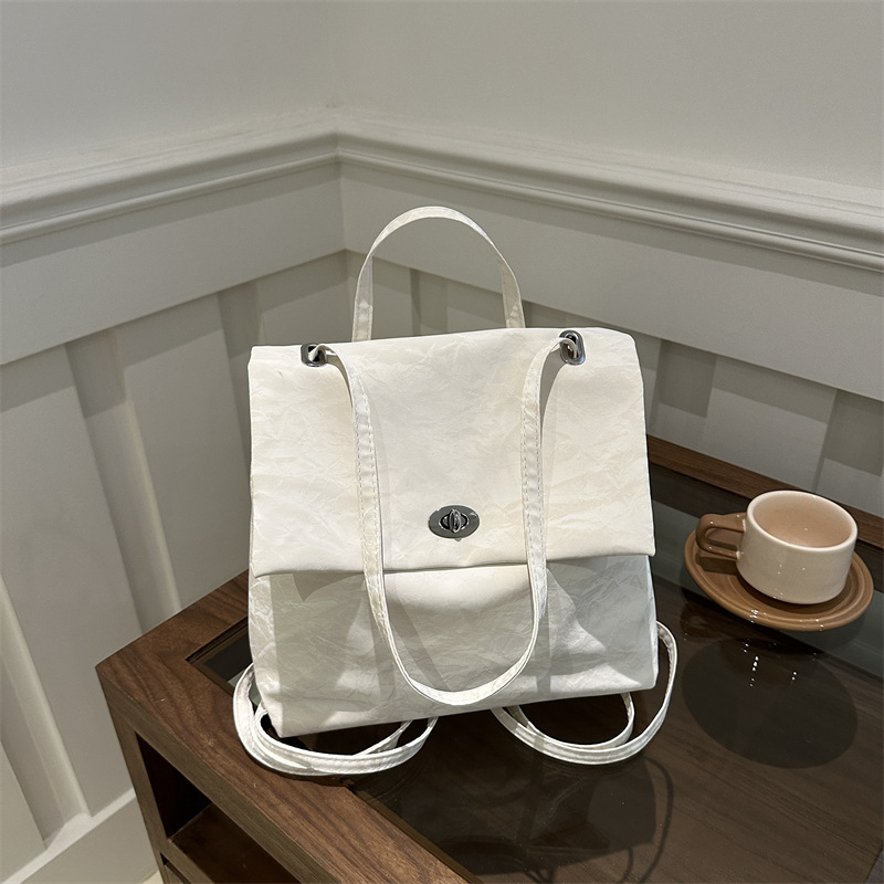Mochila de moda coreana para mujeres 2024 verano nuevo estilo simple ocio de gran capacidad versátil mochila corta