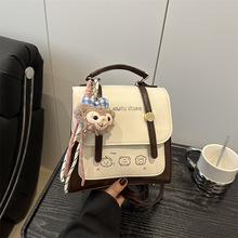 2025大容量包包女新款英伦风复古搭扣设计双肩包学生斜挎通勤方包