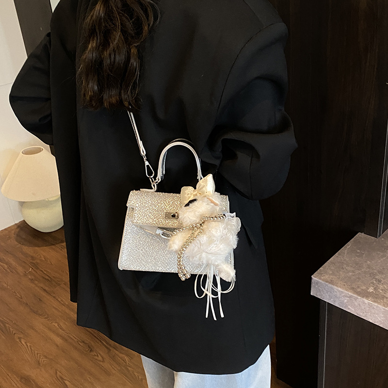 Bolso Kelly portátil de alta gama de moda transfronteriza para mujer 2025 nuevo estilo salvaje estilo occidental color sólido bolso de mensajero casual de un solo hombro