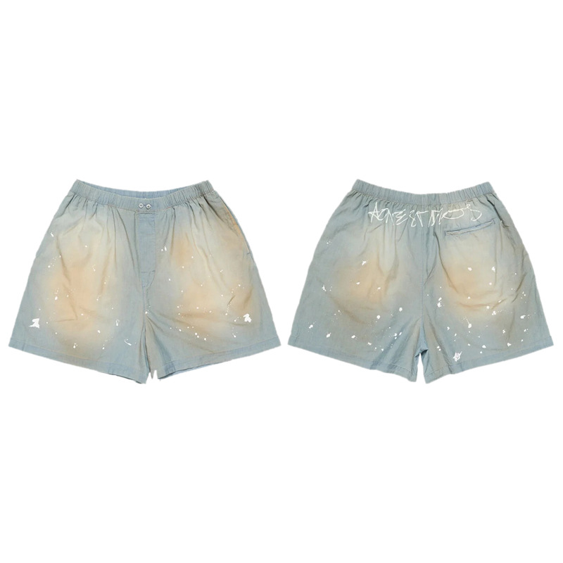 クロスボーダーのトレンディなAC手描きのスプラッシュインクのほつれ加工のウォッシュ加工のダメージ加工のパンツ、男性と女性用、ゆったりと多用途、軽くて豪華なワイドレッグジーンズ