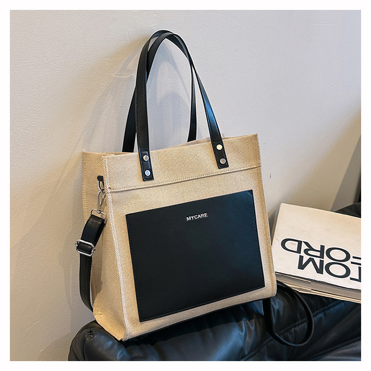 Bolso portátil de lona personalizado para mujer nueva tendencia con logotipo impreso en color casual bolso de mensajero de viaje de negocios