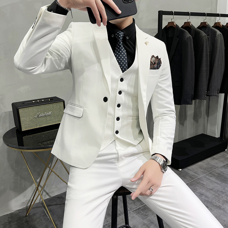 Venta al por mayor de nuevos productos traje de color sólido para hombre 2025 moda casual traje azul delgado coreano para hombre en stock