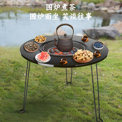新商品の囲炉裏でお茶を煮ます。小さな円卓は折りたたみ可能です。