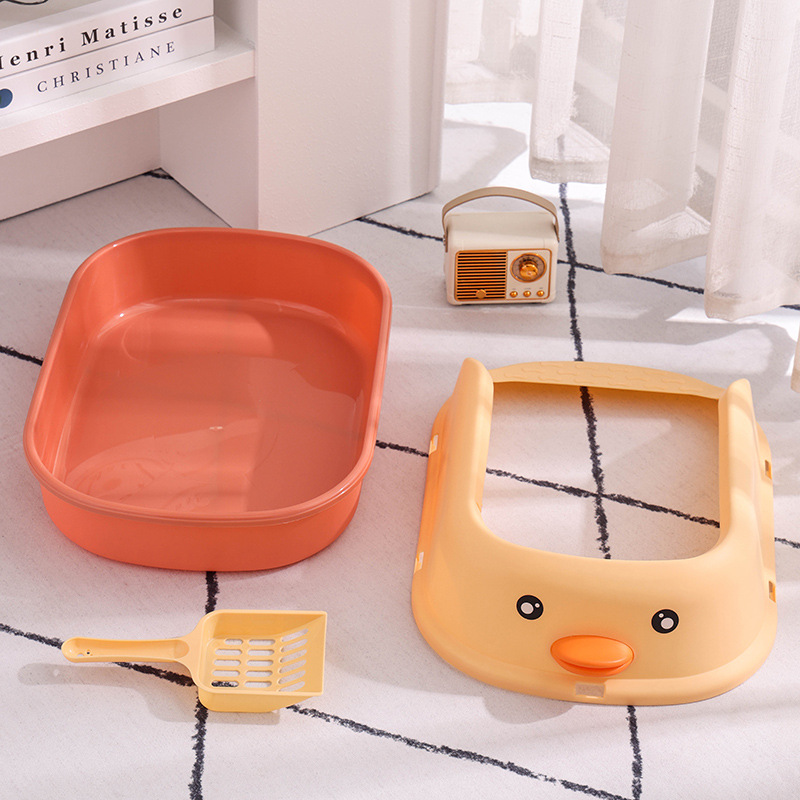 La caja de arena para gatos es grande para evitar sacar el pequeño pato amarillo, la caja de heces para gatos, el inodoro para gatos semicerrado, la caja de arena para gatos antisalpicaduras de gran tamaño