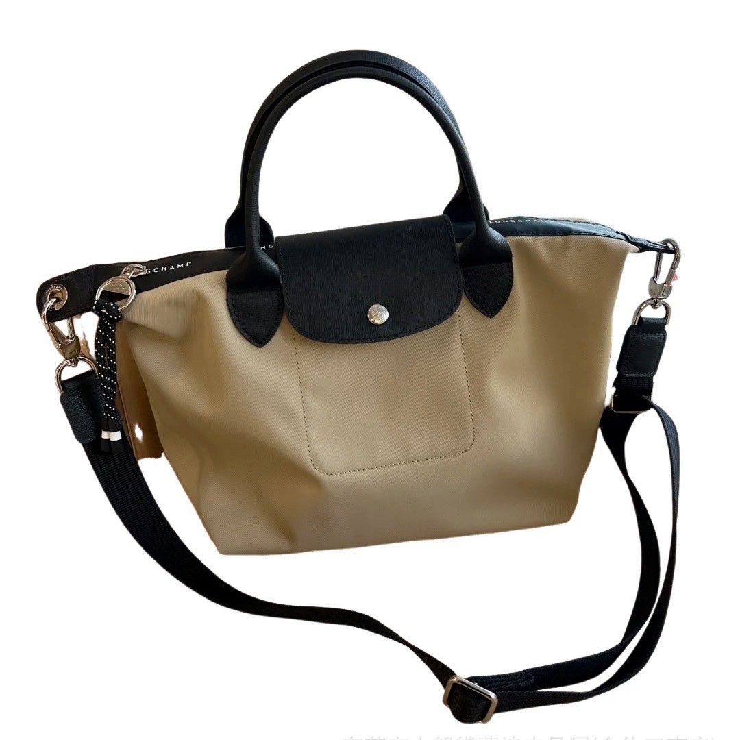 Agencia de distribución transfronteriza, segunda generación de productos de alta calidad, tela reciclada, bolsa de bola de masa, bandolera, bolso de mano