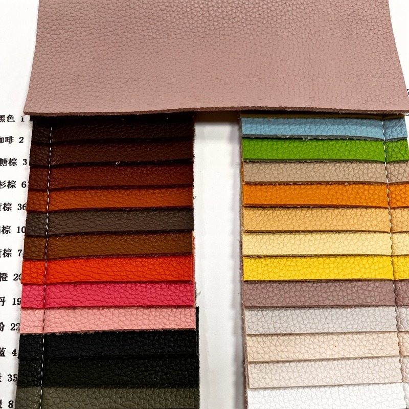 麂皮绒底荔枝纹PVC皮革环保现货手感柔软加厚荔枝箱包皮带仿皮面