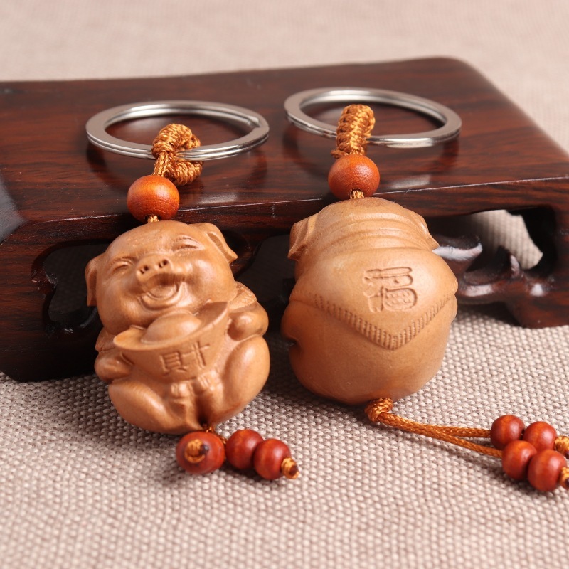 肥城桃木汽车钥匙扣精雕立体剑貔貅福袋四季平安扣算盘等钥匙扣|undefined