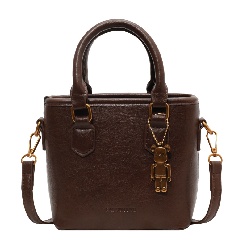 Bolso de mano para mujeres 2026 nuevo diseño de nicho universal bolso de cubo de alta sensación de explosión popular bolso de hombro