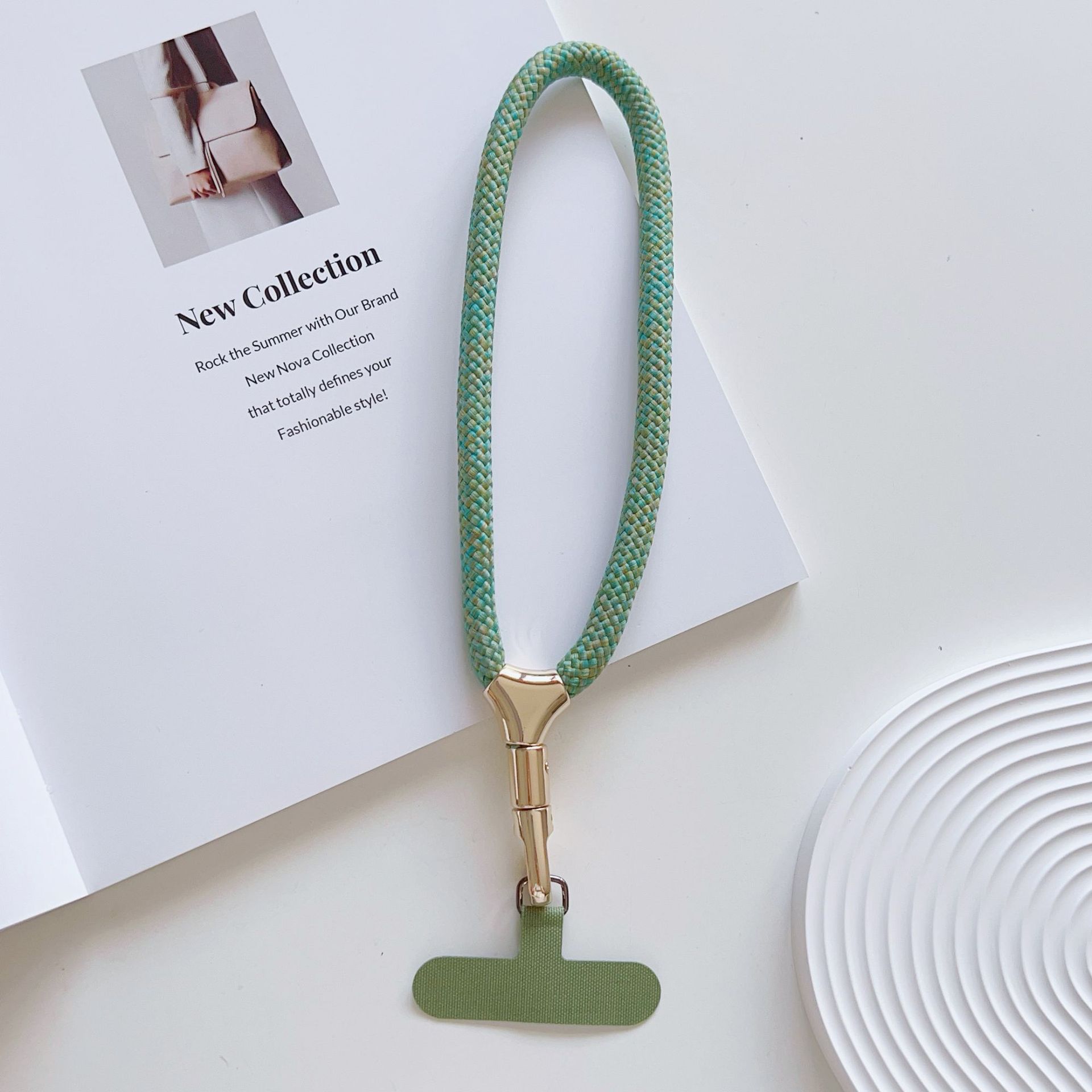 Cuerdas de muñeca ajustables de alta calidad con clips de hebilla pequeñas y frescas de poliéster corto para colgar teléfonos móviles simples y versátiles