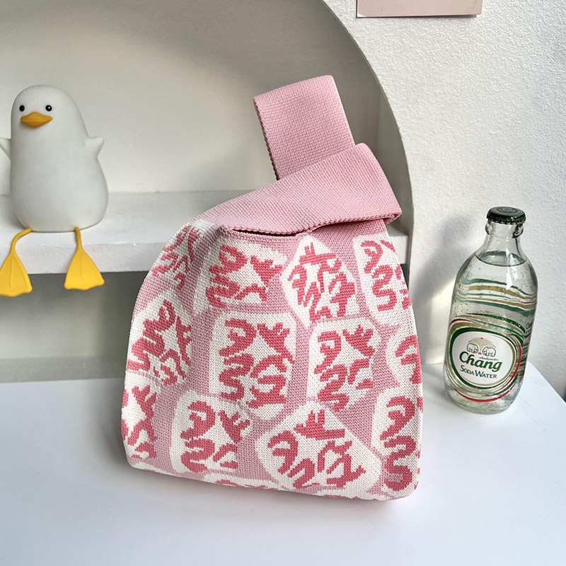 Bolso de punto de flores versión coreana del bolso de hombro de diseño de nicho de moda ins