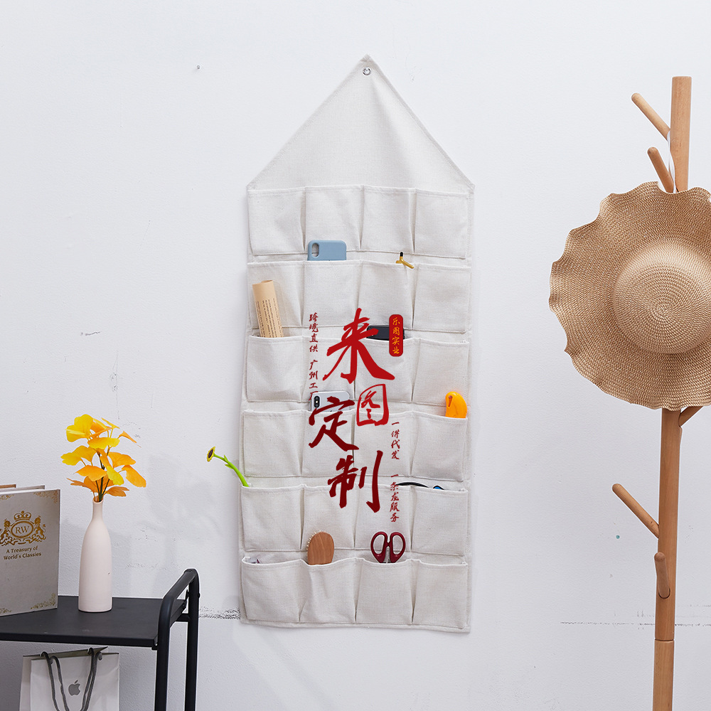 La imagen se puede fijar en la pared triángulo perforado bolsa de almacenamiento de algodón y lino que organiza la sala de estar bolsa de almacenamiento de artículos diversos detrás de la puerta