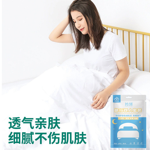 Travel disposable four-piece set bed sheet, duvet cover, pillowcase hotel inn non-woven travel supplies set hotel