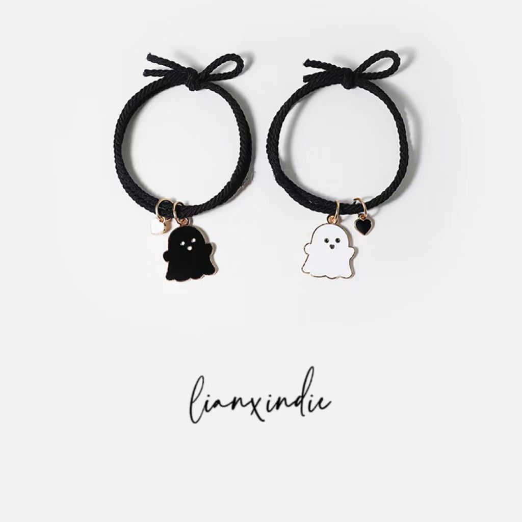 Pareja de fantasmas de dibujos animados cuerda de mano de succión magnética colgante de fantasma pequeña cuerda de corbata fresca boutiques cuerda de pelo de Estudiante