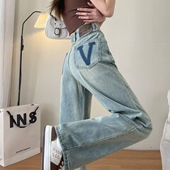 ハイウエストの狭いバージョンのストレートジーンズの女性2025年春秋の新型の爆発的なデザイン感があります。