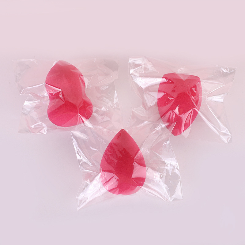 Embalaje independiente belleza huevo poliuretano maquillaje esponja polvo húmedo y seco soplo no-látex fábrica de bolas de maquillaje al por mayor