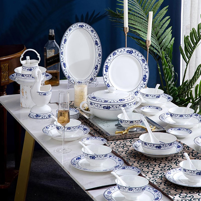Matching individual pieces available: Bone china bowl and chopsticks, ceramic dishes and plates, and glassware with floral motifs Matching individual pieces available: Bone china bowl and chopsticks, ceramic dishes and plates, and glassware with floral motifs