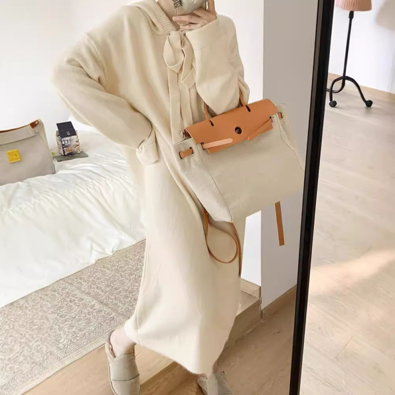 韓国版のゆったりしたワンピースの女性は秋冬に帽子のニットの洋気毛群の底のシャツのセーターのスカートのコートを厚くします。|undefined