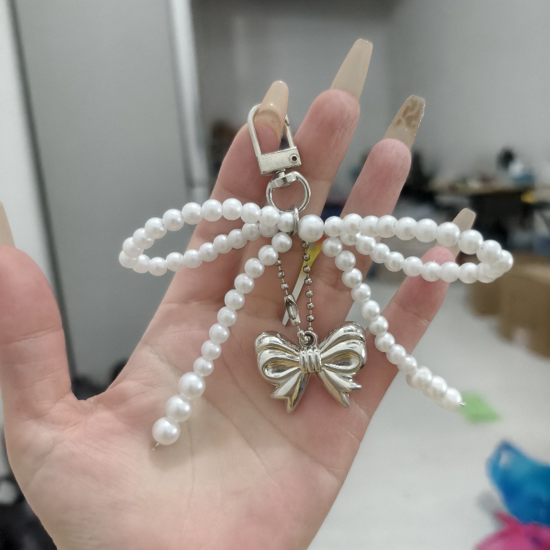 Nuevo estilo di-ins estilo coreano arco de perla amor colgante llavero accesorios de bolsos colgantes de teléfonos móviles