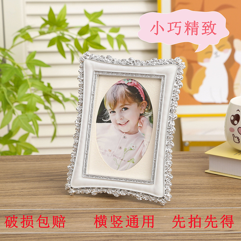 Cross-border 2041 6-inch oval photo frame cute high-value children according to couples according to the horizontal universal wholesale