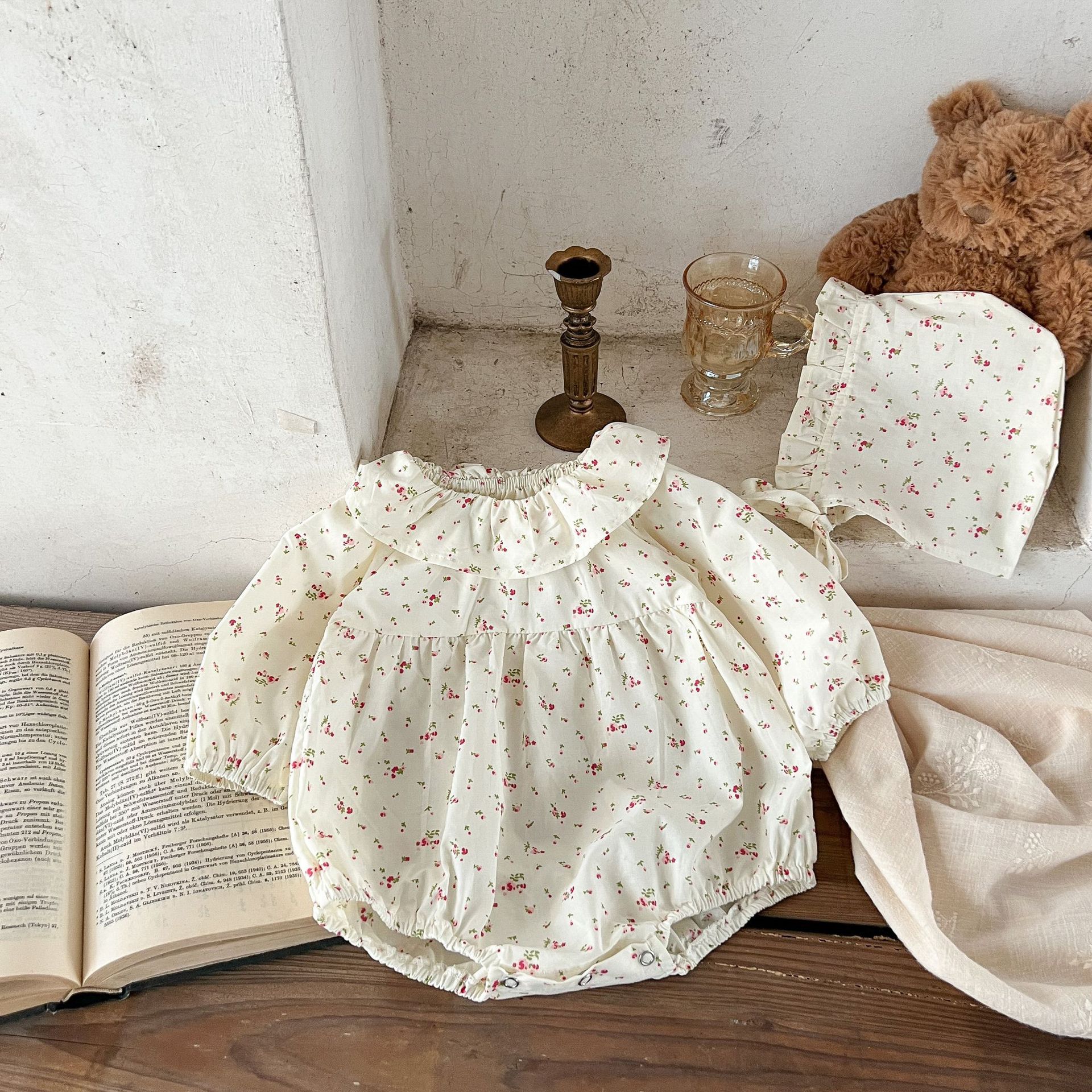 Estilo coreano niñas bebé Lotus collar floral con capucha mameluco ins recién nacido algodón suelto mono triángulo escalada