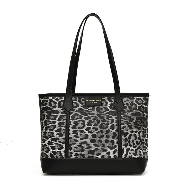 Bolsa de leopardo retro esmaltada para mujeres 2024 nueva moda bolso de hombro de brazo otoño y invierno gran capacidad bolso de viaje