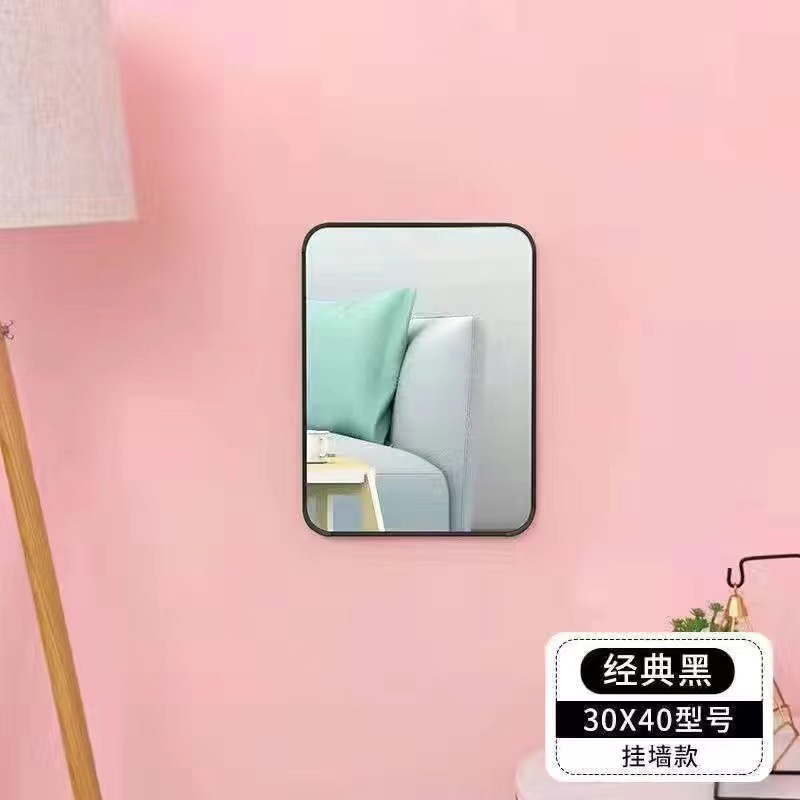 El espejo de vestir de la tienda de ropa es delgado y hermoso. Espejo de vestir súper blanco. Espejo de piso arqueado para tienda de ropa para mujeres.