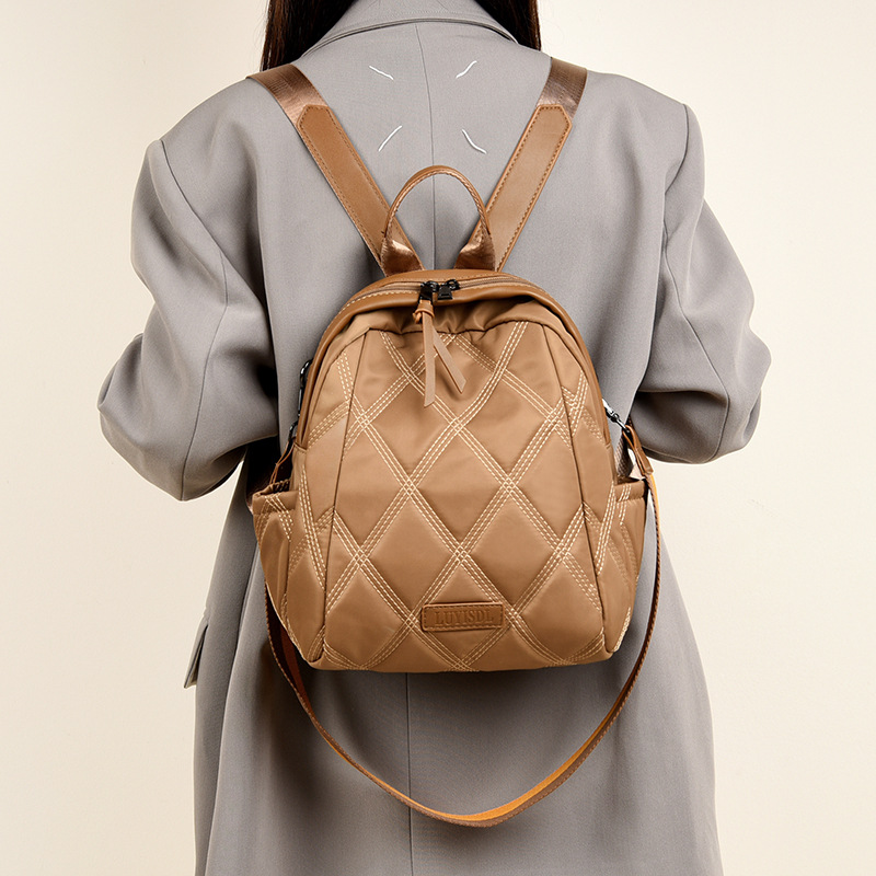 Mochila de moda coreana popular de mujer, bolsas de mujer de color sólido simple, nueva moda de comercio exterior, mochila de viaje.