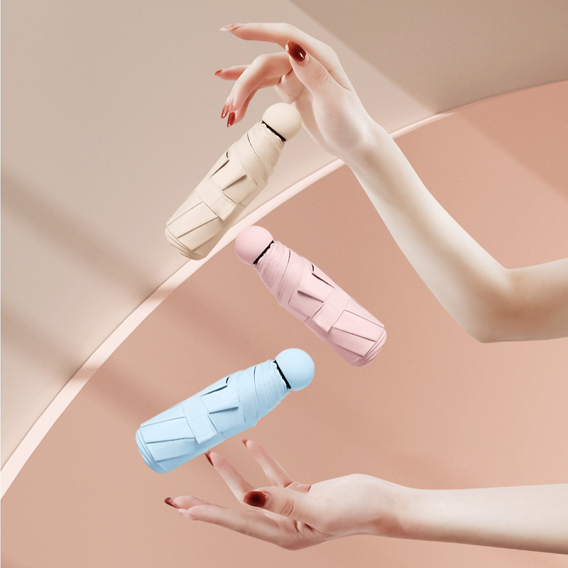 Nuevo paraguas de cinco veces seis huesos ultra-luz espejo caja cápsula paraguas sombrilla negro pegamento protección solar protección UV publicidad paraguas