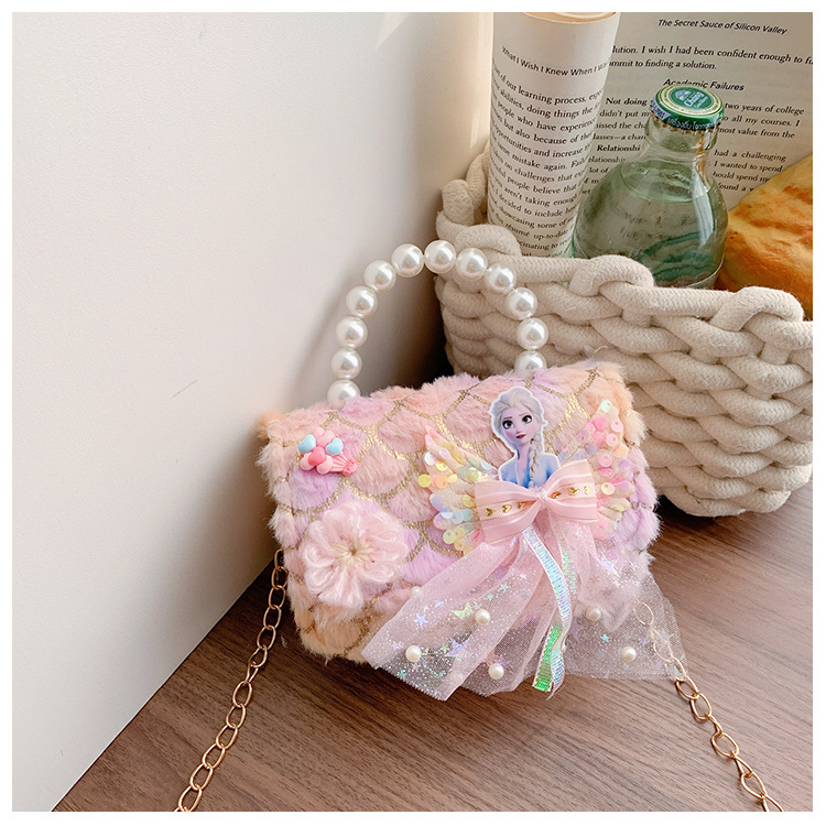 Bolsas de niños transfronterizas otoño y invierno nuevos lindos bolsos de peluche de perlas mini princesa bolsos de cadena de colores