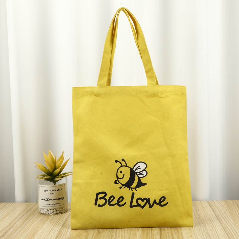 2025年帆布托特包日系通勤用布袋包大学生上课便携帆布袋简约现代